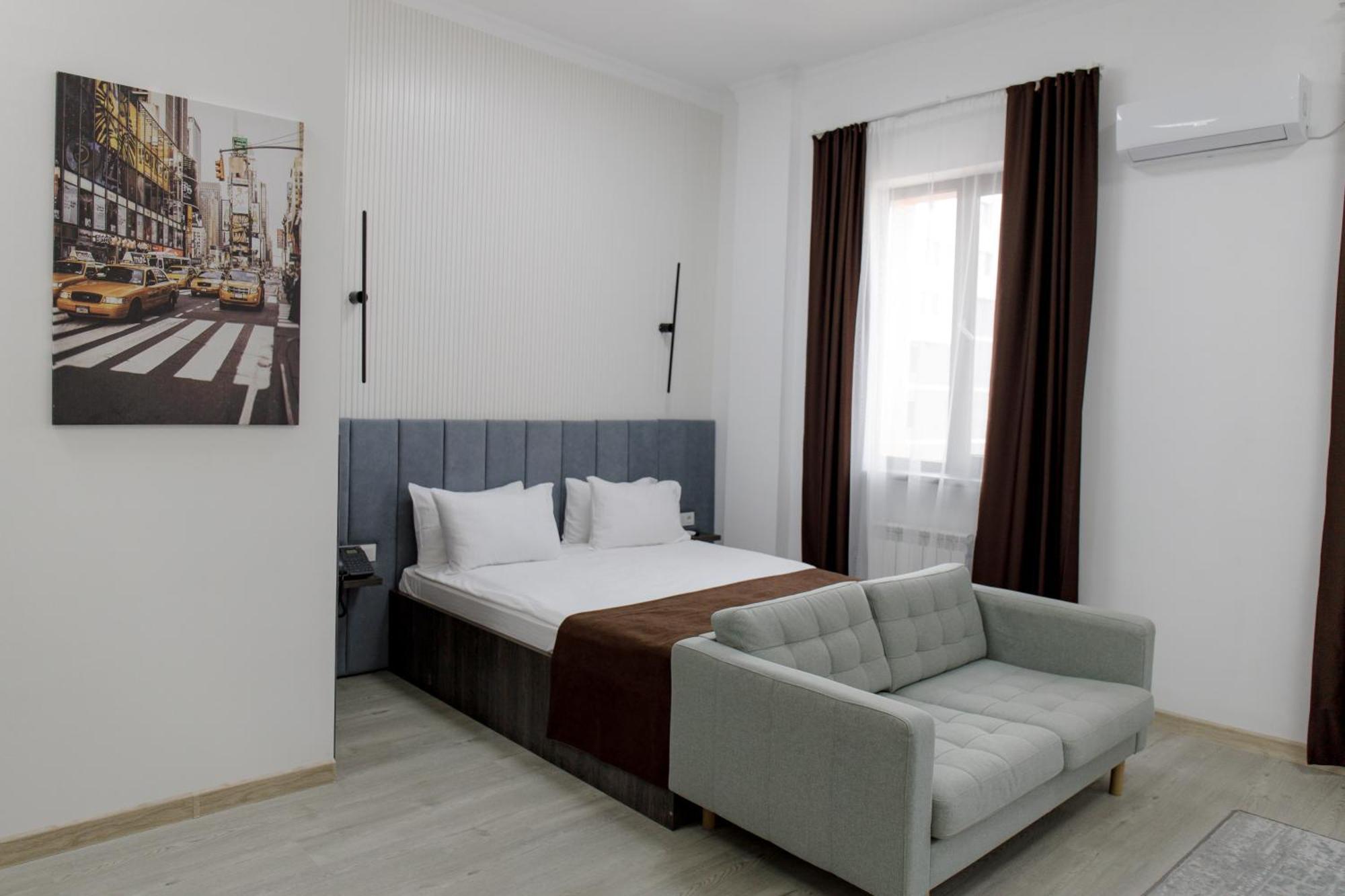 Infinity Plaza Block 1 Hotel Atyrau Exterior photo